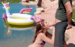 Porn Video: A dude is tempting teen Riley Reid with his big cock and fucking her at pool side